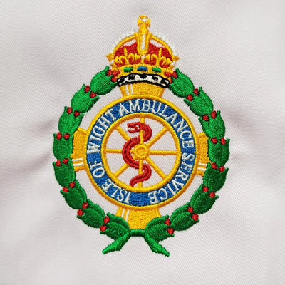 Embroidered logo of the Isle of Wight Ambulance Service on a white background