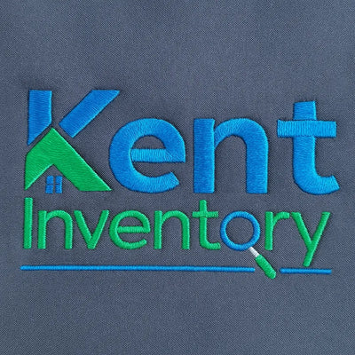 Embroidered 'Kent Inventory' logo on a dark gray background