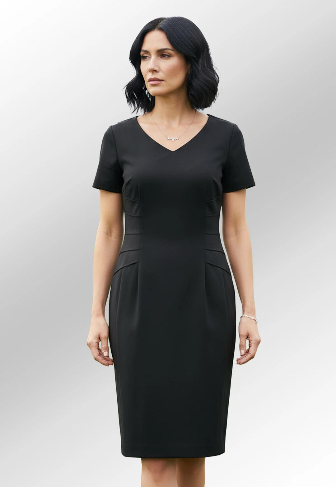 Video of model wearing the black tailored funeral dress by Brook Taverner