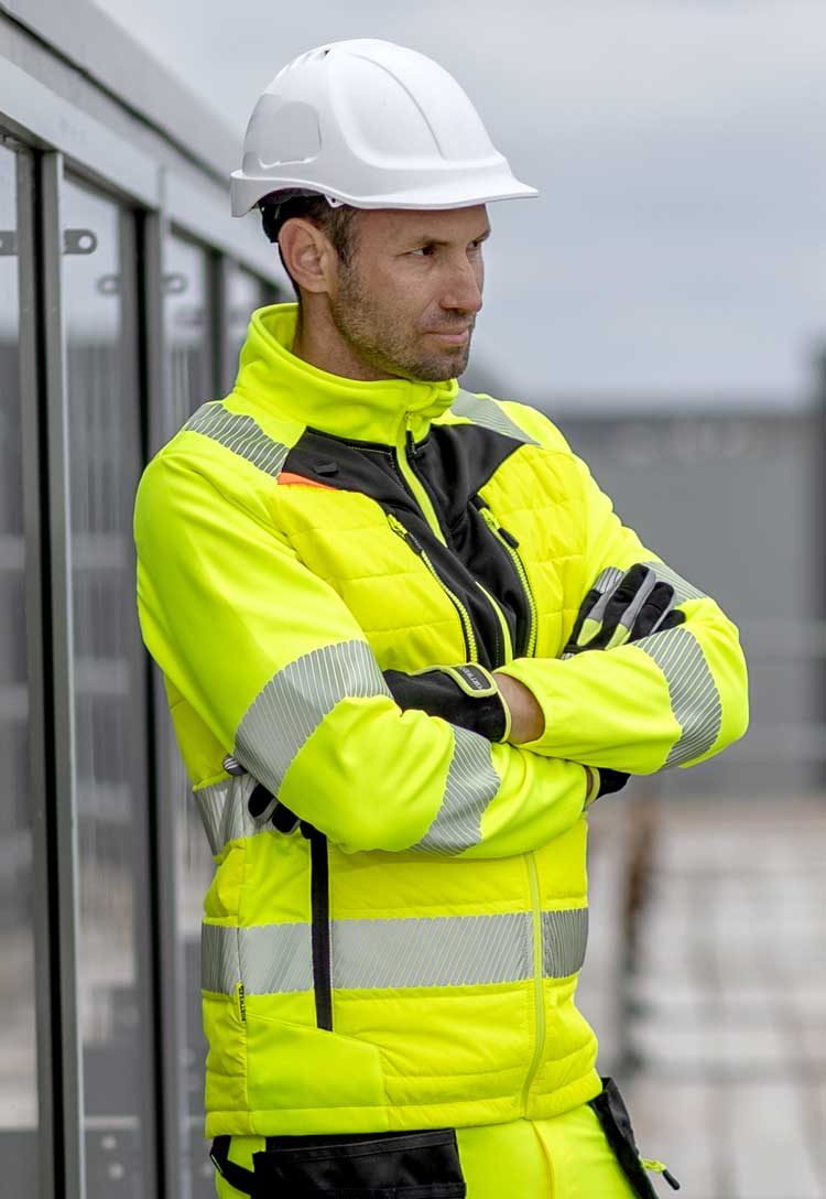 Model Wearing Hi-Vis Hybrid Baffle Jacket DX473 in Yellow/Black