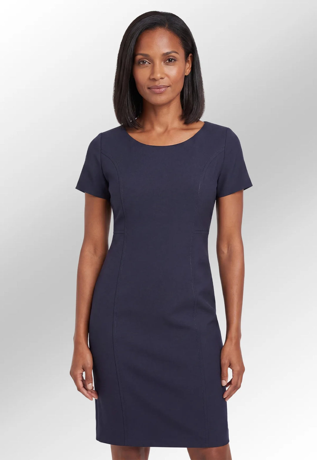 Model wearing the Brook Taverner Teramo Dress in Navy