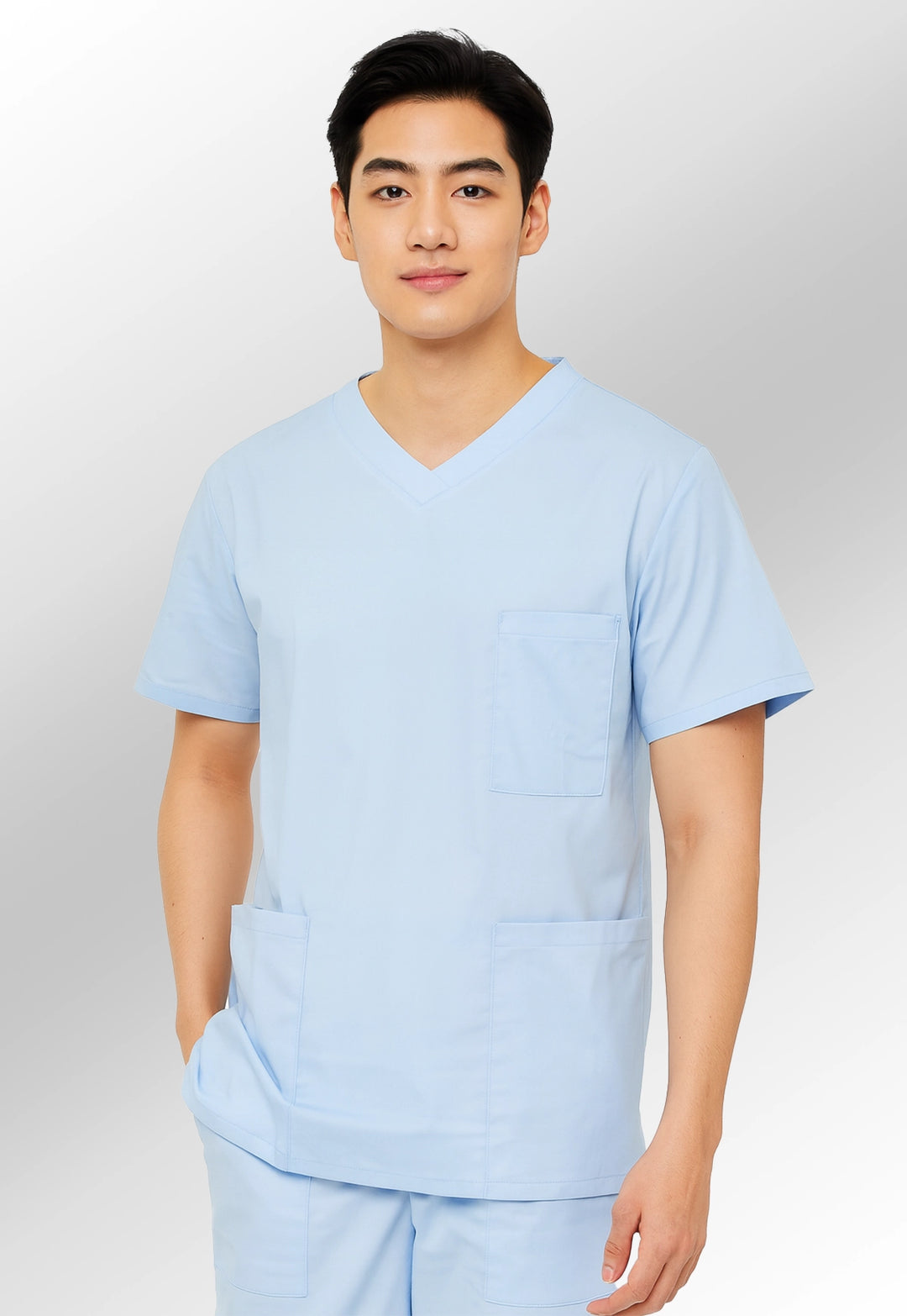 model wearing 8800 Scrub Top in sky blue