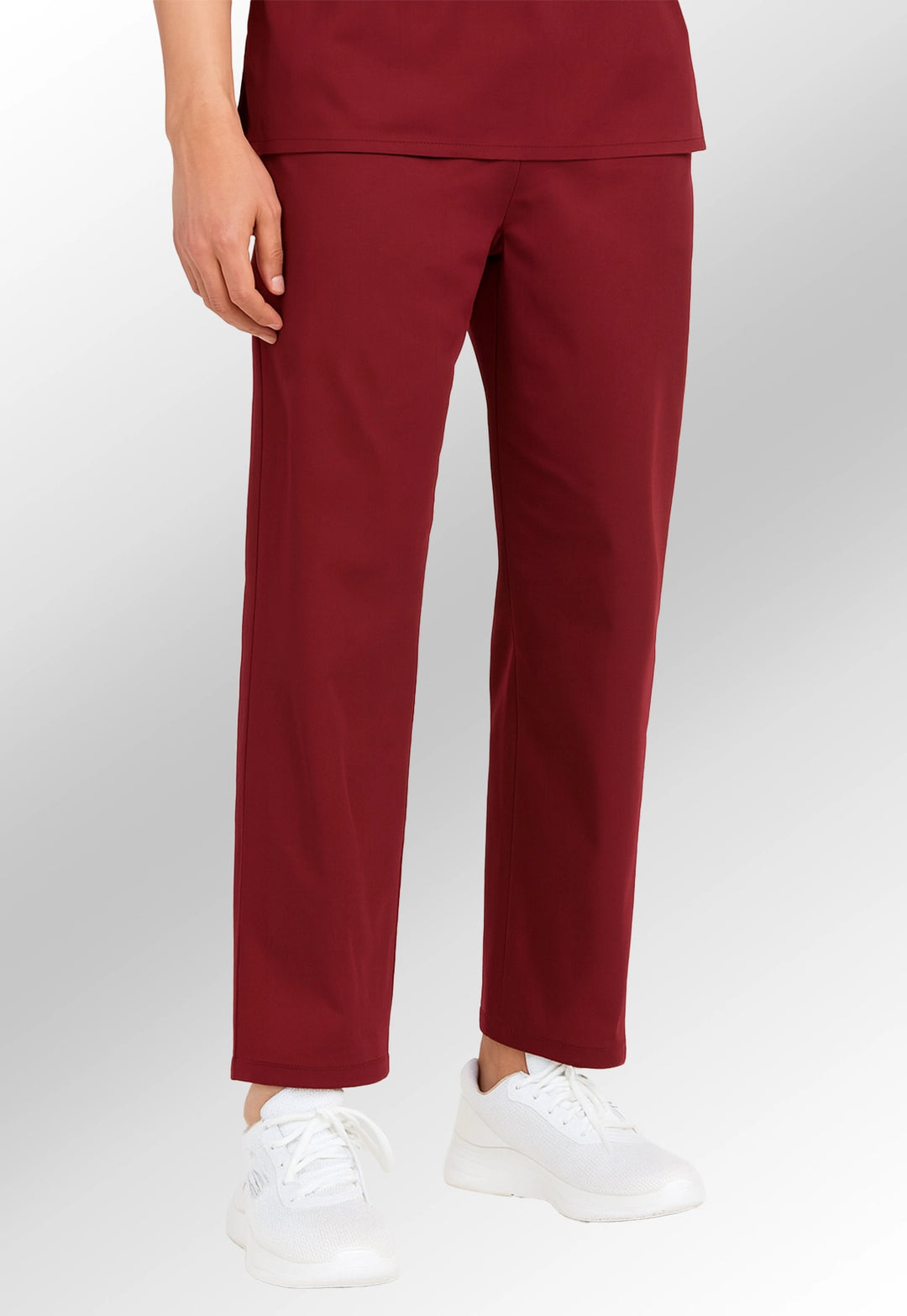 model wearing 8900 Scrub Trousers in maroon