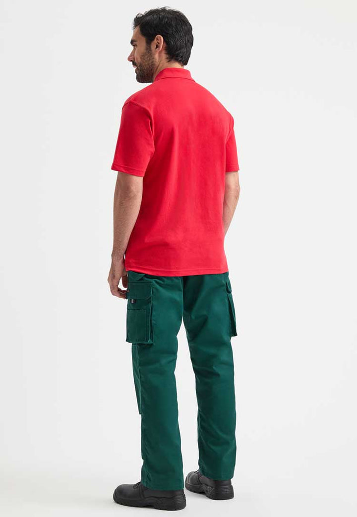 full length back view of model wearing uneek active polo in red