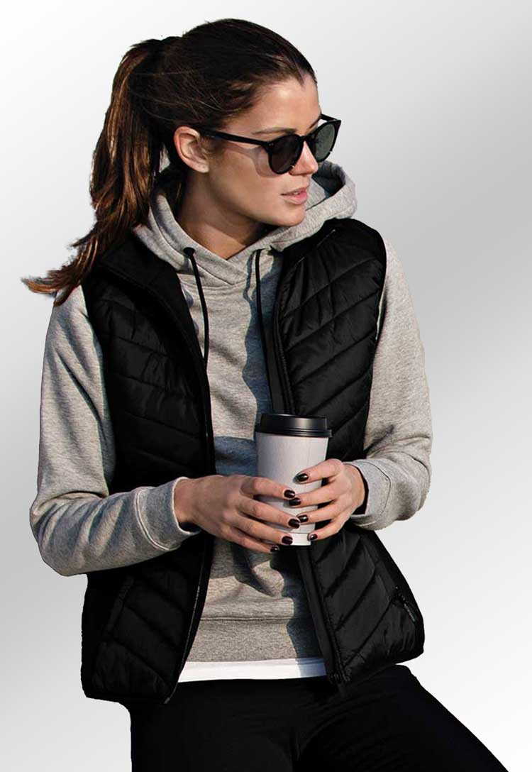 Model Wearing Women’s Benton Versatile Hybrid Vest NP10F in Black