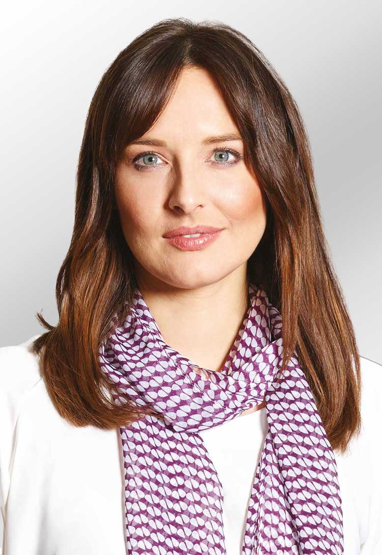 Model Wearing Patterned Scarf in Aubergine Petals