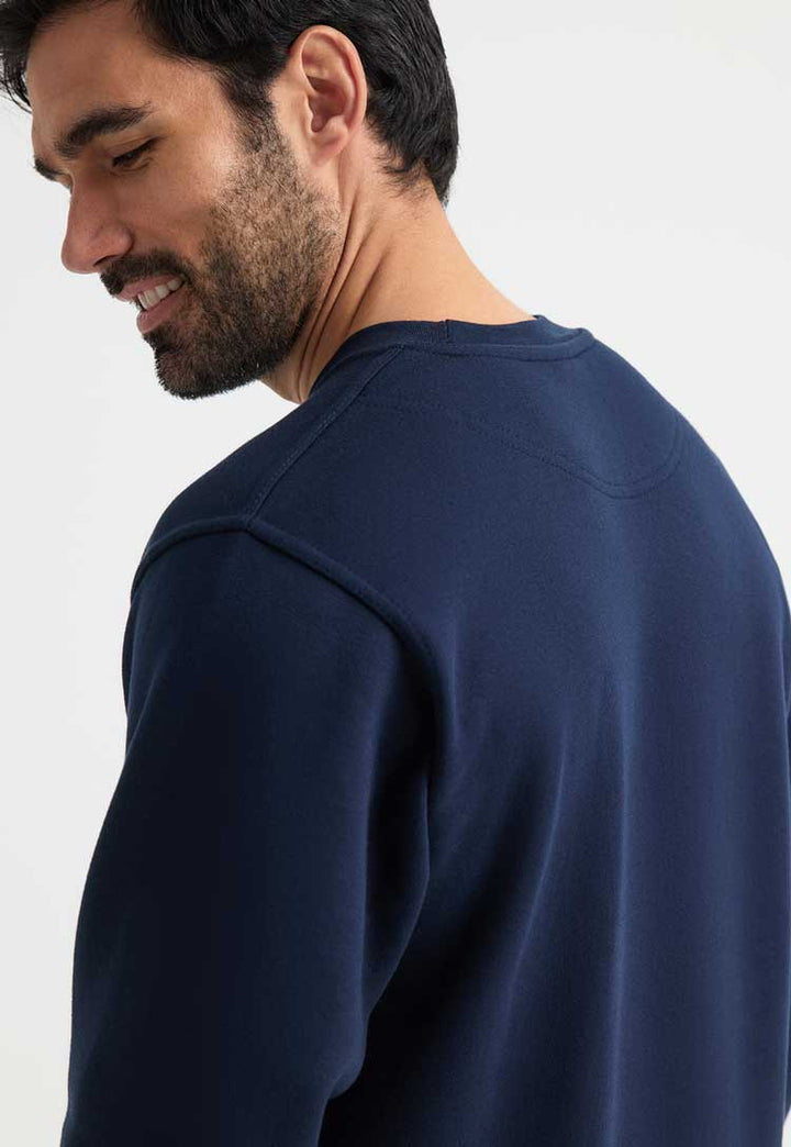 close up of model wearing Premium Sweatshirt in navy