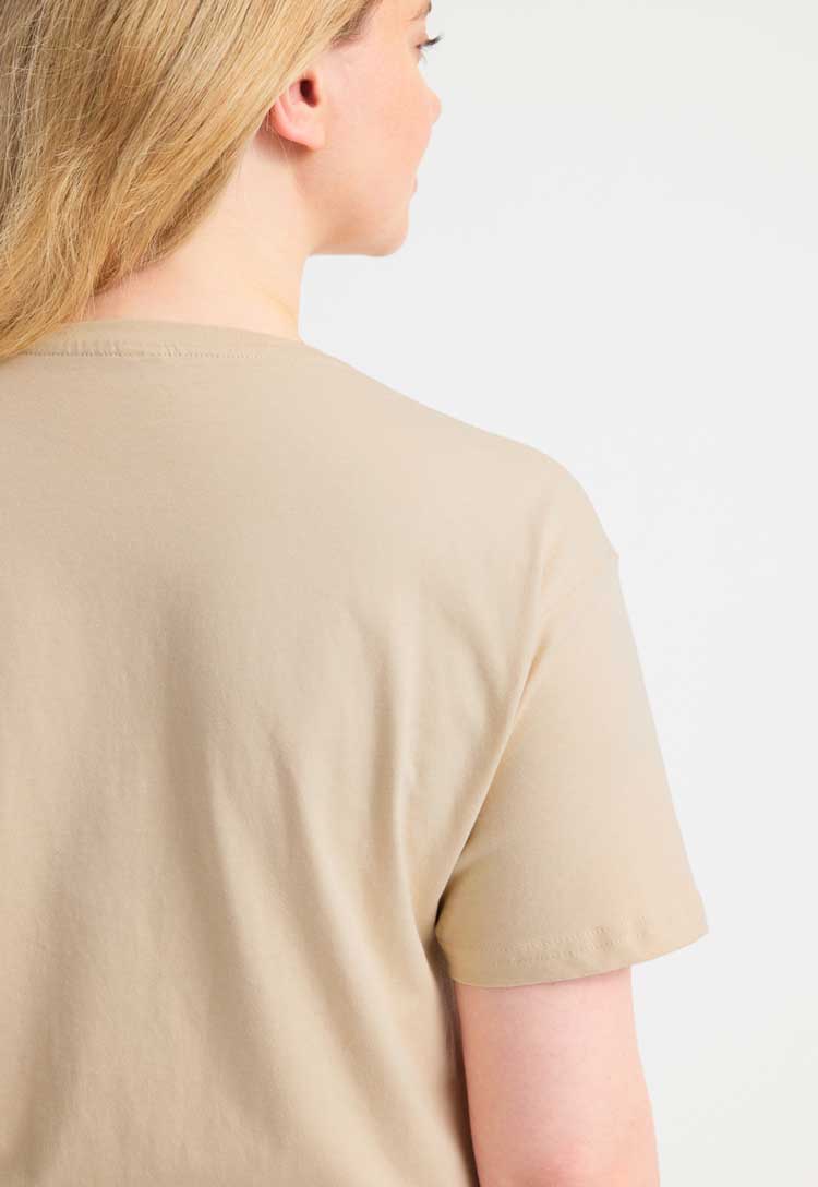 back view close up model wearing Classic T-Shirt in beige