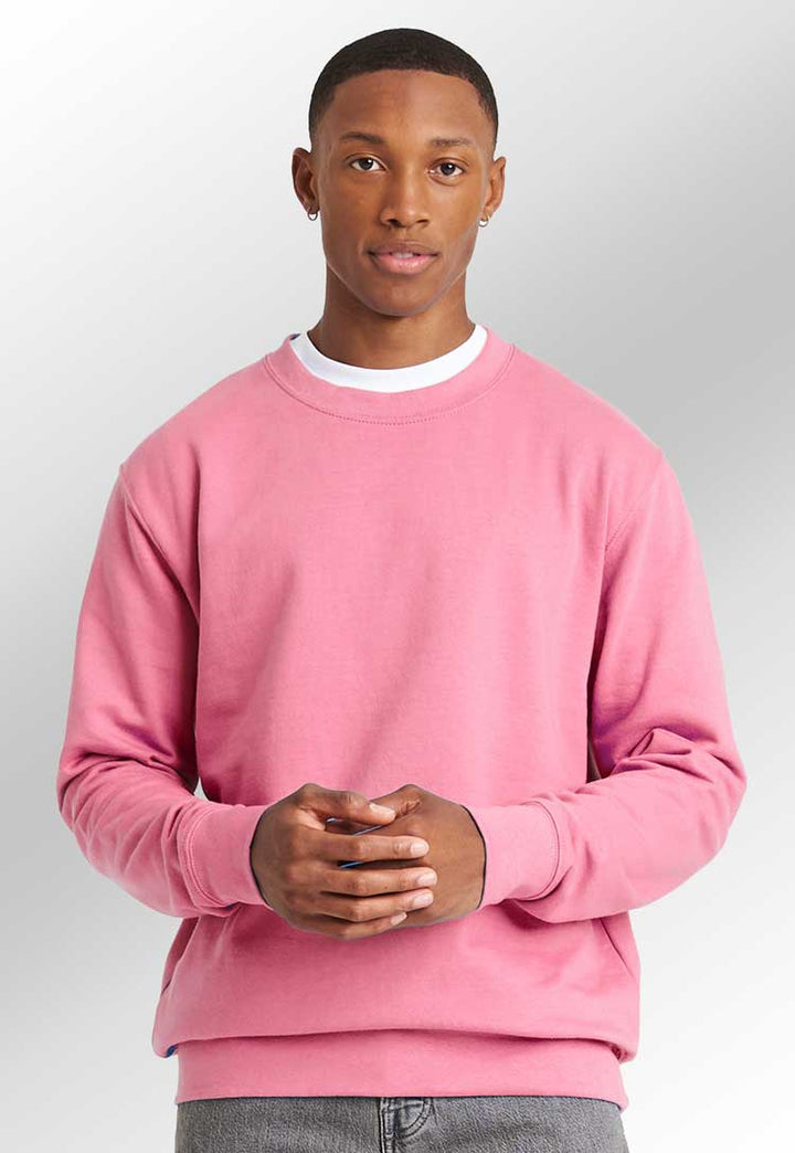 Model wearing AWDis Sweatshirt (Pink, Purple) JH030 in candyfloss pink