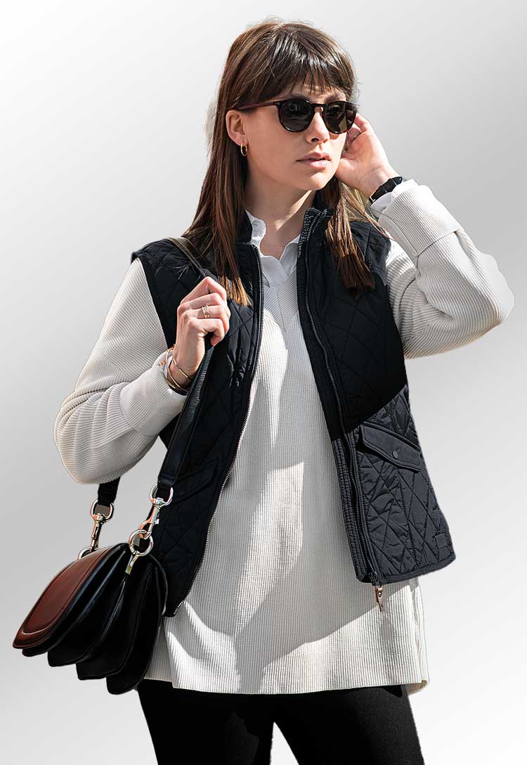 Model Wearing Women’s Camden Diamond Quilted Gilet NB46F in Midnight Blue