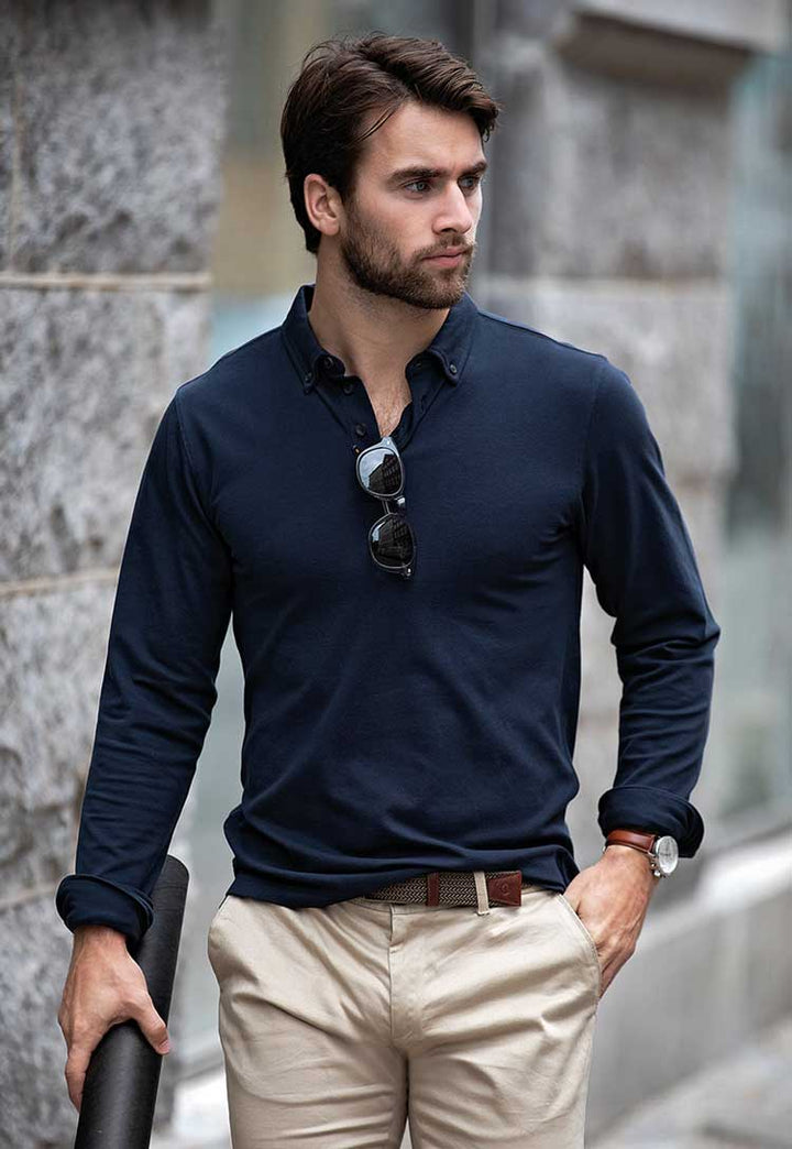 Model Wearing Carlington Deluxe Long Sleeve Polo NB71M in Navy