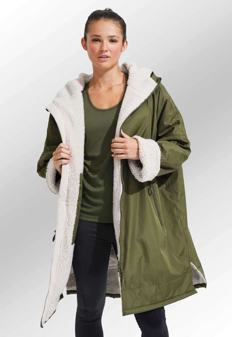 Model wearing TriDri® All-Seasons Waterproof Changing Robe TR800 in olive