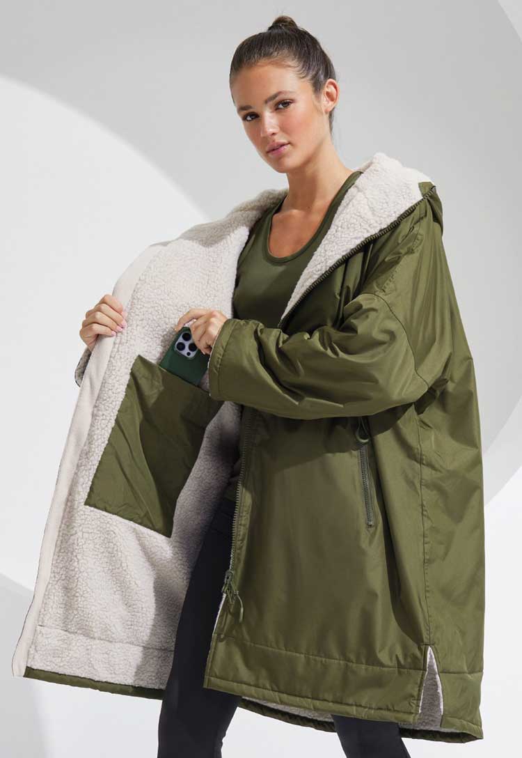 Model showing inside pocket of TriDri® All-Seasons Waterproof Changing Robe TR800