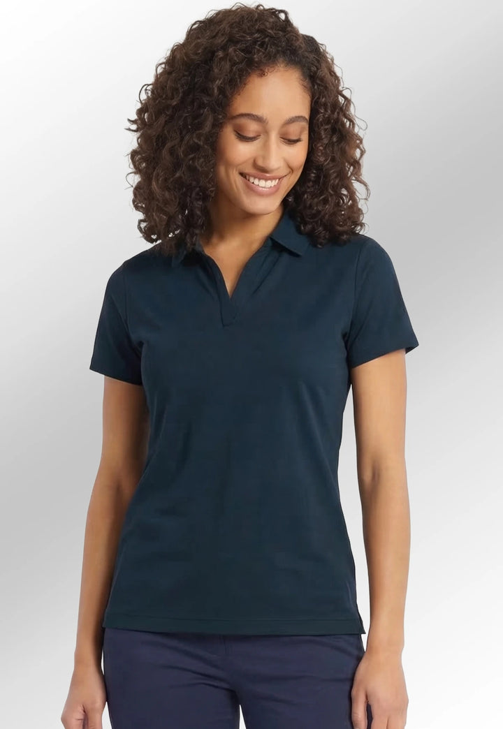 Model wearing the Women’s Clearwater Quick-Dry Performance Polo NB86F in Navy
