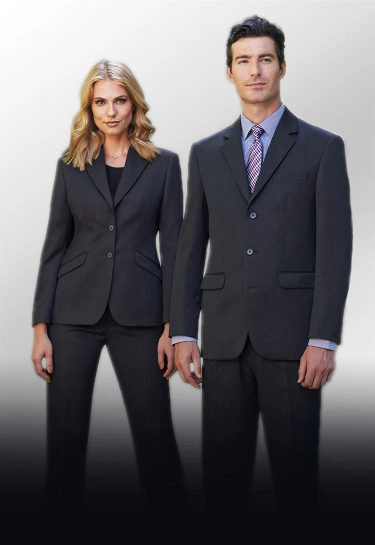A woman and man wearing Brook Taverner Concept Collection workwear suits