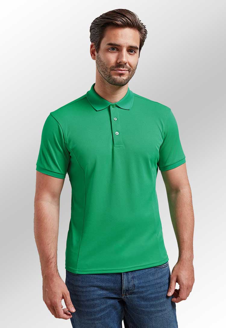 Model wearing Coolchecker® Plus Piqué Polo PR630 in kelly green