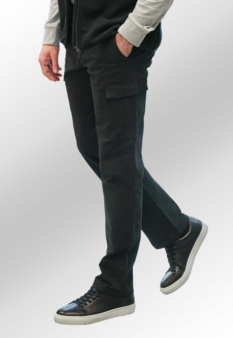 Model wearing Durham Chino Cargo Trousers in black