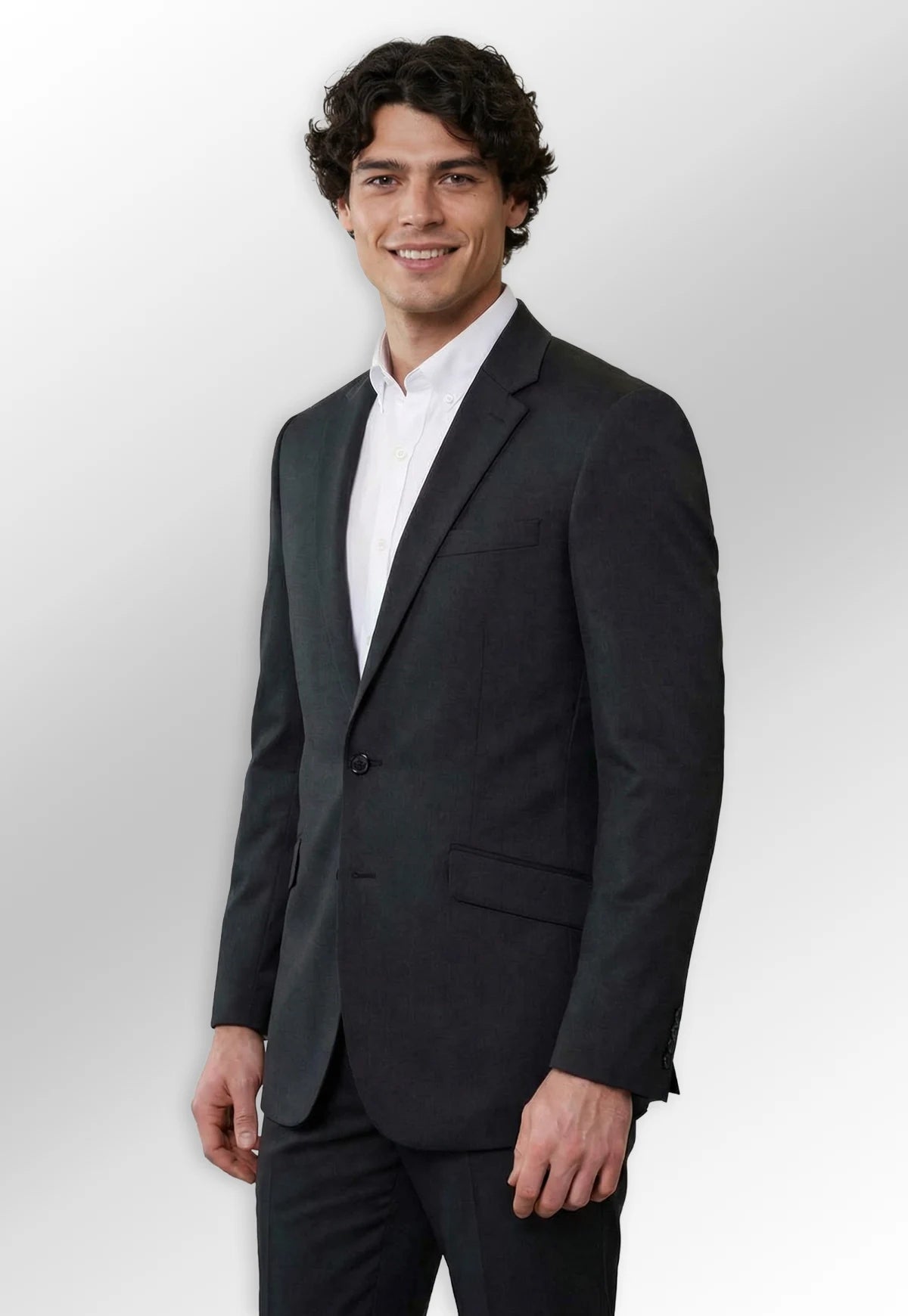 Model wearing the Phene Tailored Fit Suit Jacket and Trousers from the Brook Taverner Eclipse Menswear Collection.