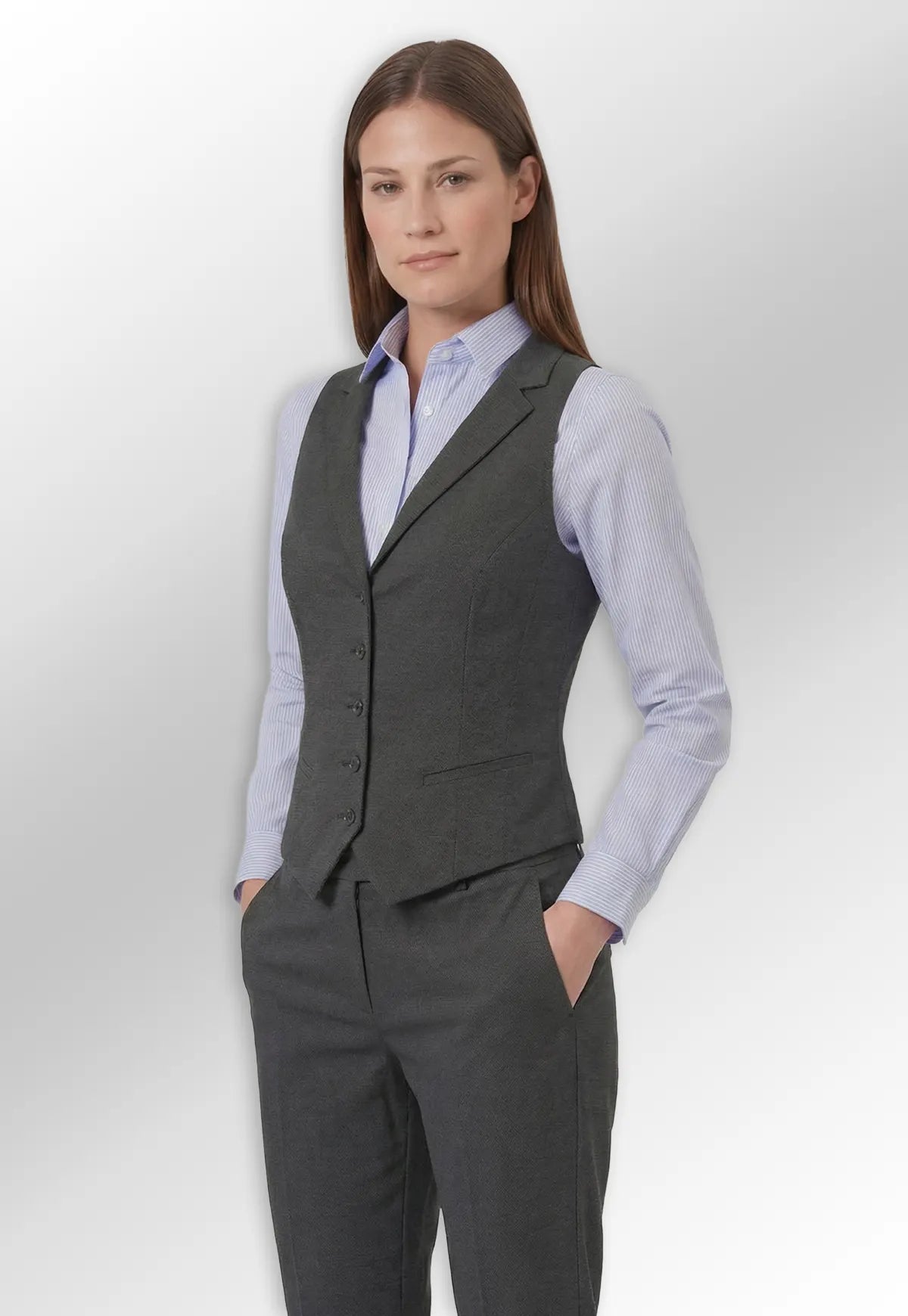Model wearing waistcoat and suit trousers from the Brook Taverner Eclipse Womenswear Collection.