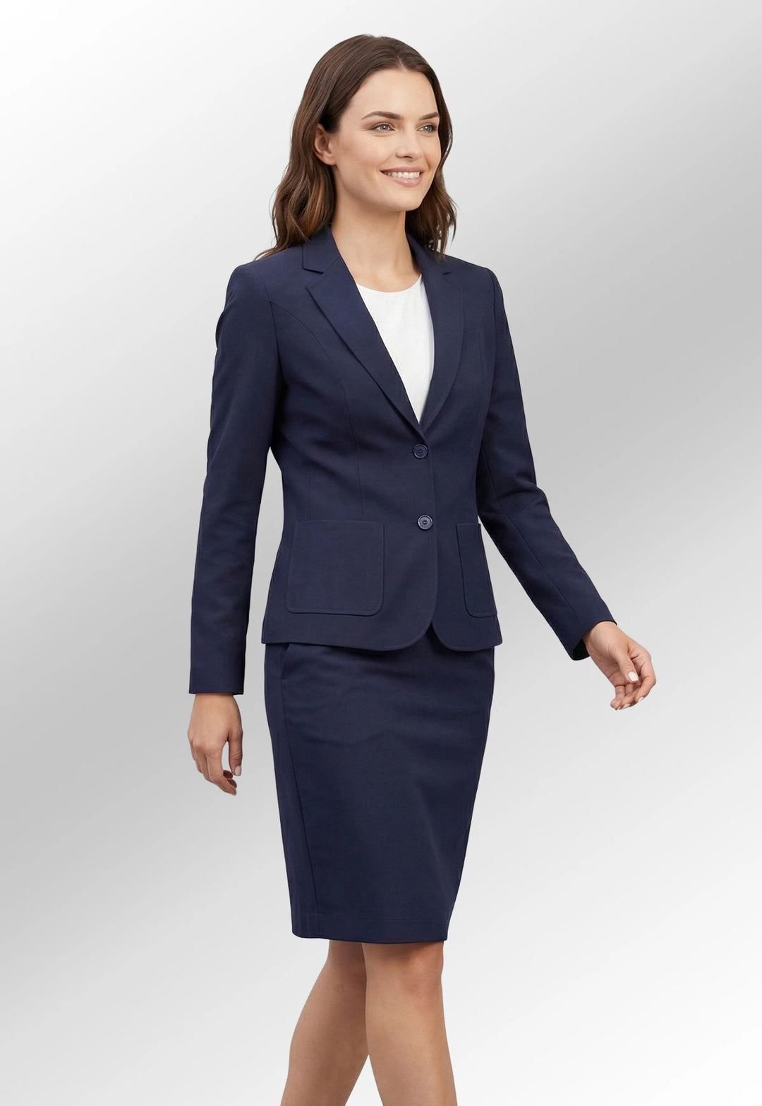 Model wearing the Brook Taverner Edition Suit Jacket and Merchant A-Line Skirt in Navy