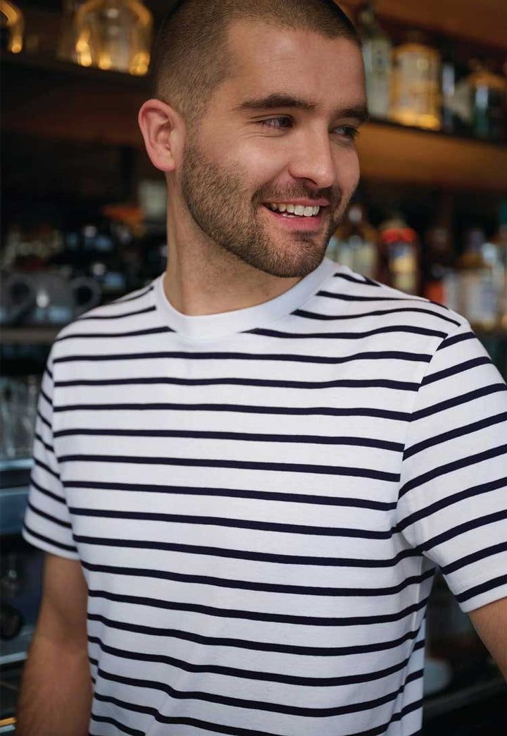 close up model wearing Edmund Breton top in white/navy