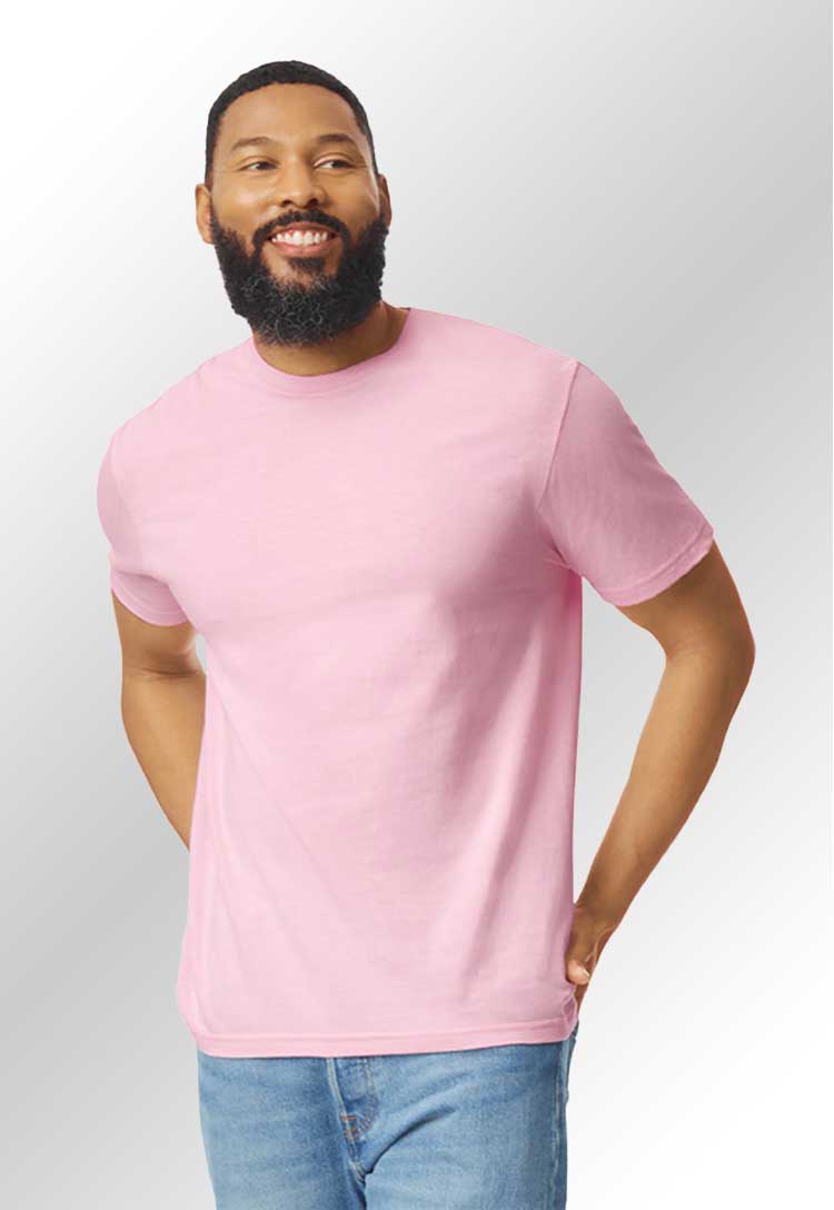 A model wearing a GD001 Softstyle adult ringspun t-shirt in Light Pink