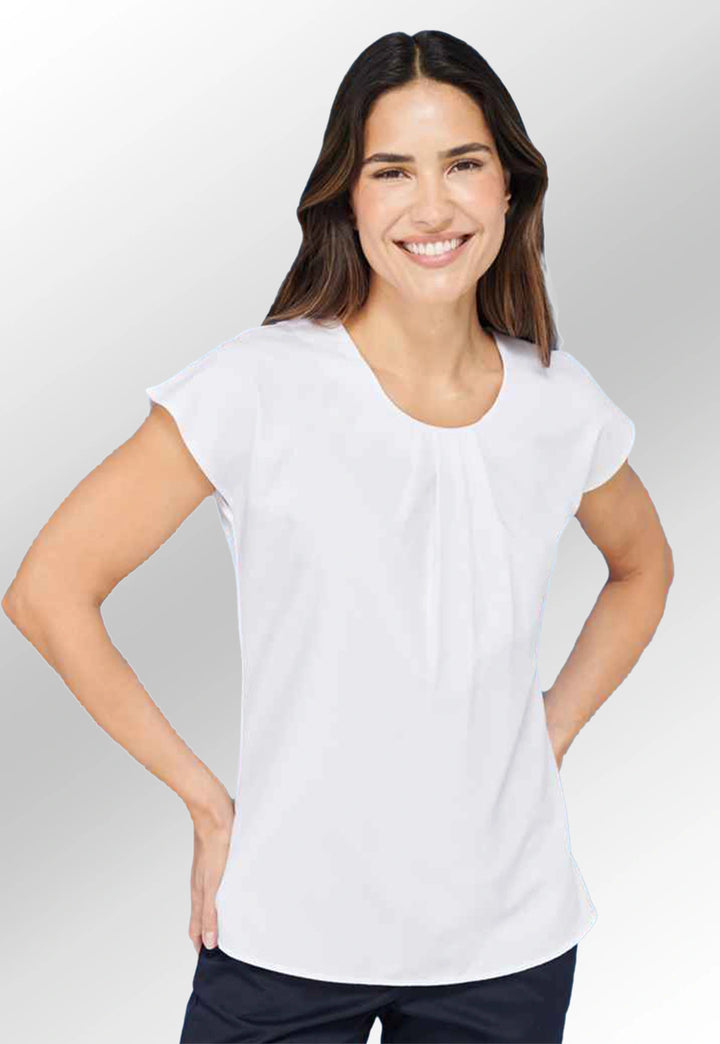 Model wearing the Henbury Women's Pleat Front Short Sleeve Blouse HB597 in White.