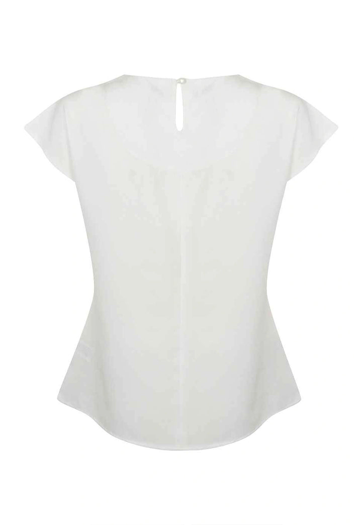 Rear view of the Women's Pleat Front Short Sleeve Blouse in White.