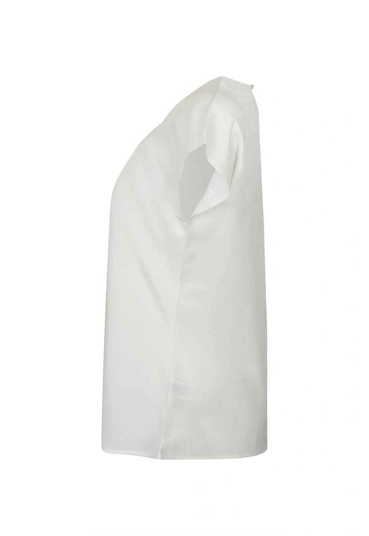 Side view of the Women's Pleat Front Short Sleeve Blouse in White.