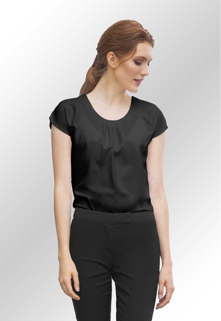 Model wearing a HB597 Women's pleat front short sleeve blouse in Black