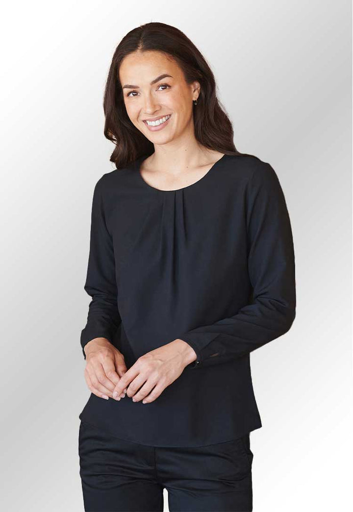 A model wearing HB598 Women's pleat front long sleeve blouse in Black