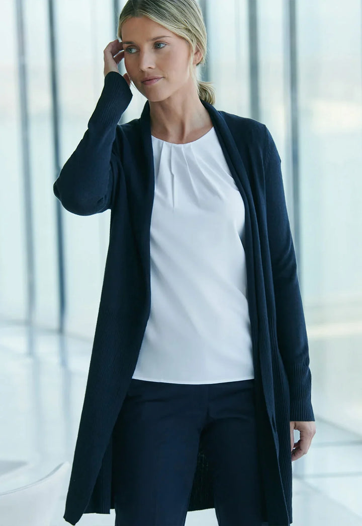 Lifestyle photo of model wearing the Women's Longline Open Cardigan HB719 in Navy.