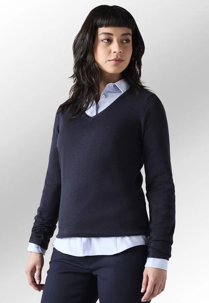 Model wearing the Henbury Women's 12 Gauge V Neck Jumper in Navy paired with a collared shirt.