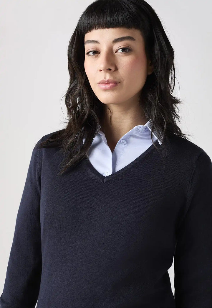 Close-up of model wearing the Henbury Women's 12 Gauge V Neck Jumper in Navy paired with a collared shirt.