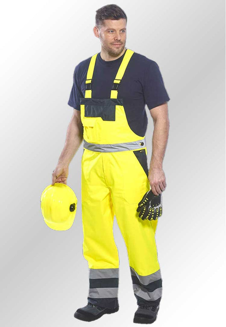 Model Wearing Hi Vis Contrast Bib and Brace Unlined S488 in Yellow/Navy