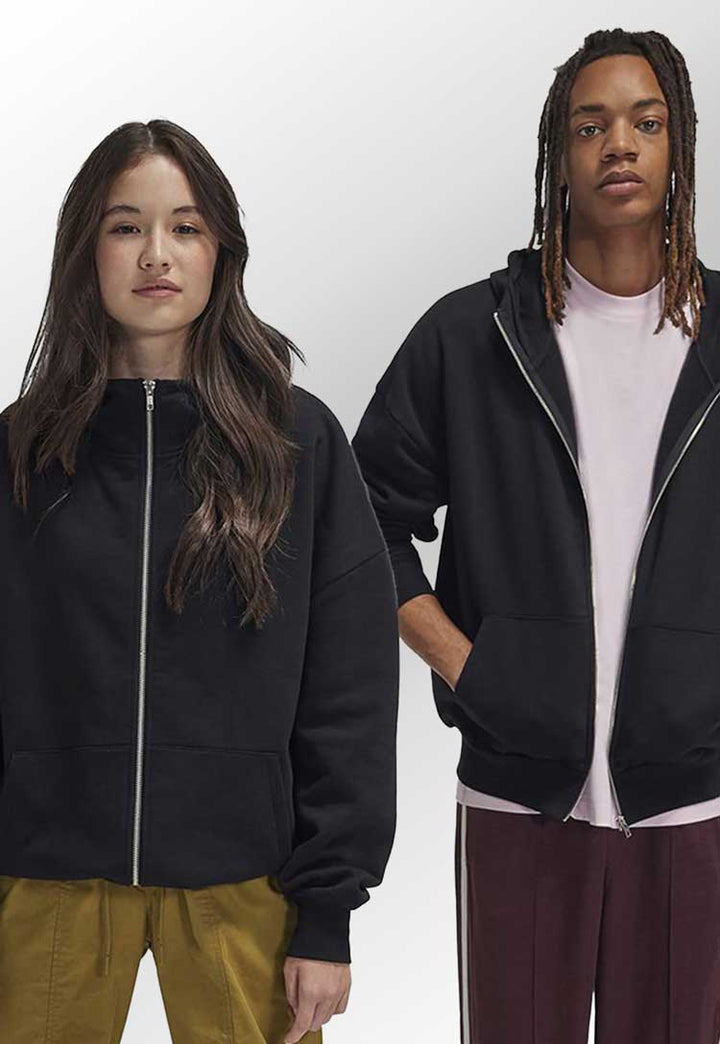 Models wearing B&C Influence Zip Hood BA035