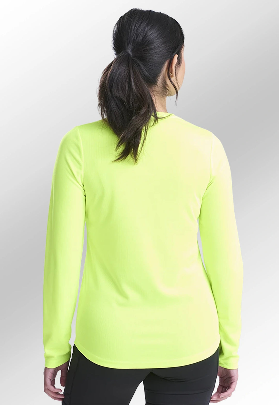 Rear view of model wearing the Women's Long Sleeve Cool T-Shirt JC012 in Electric Yellow.