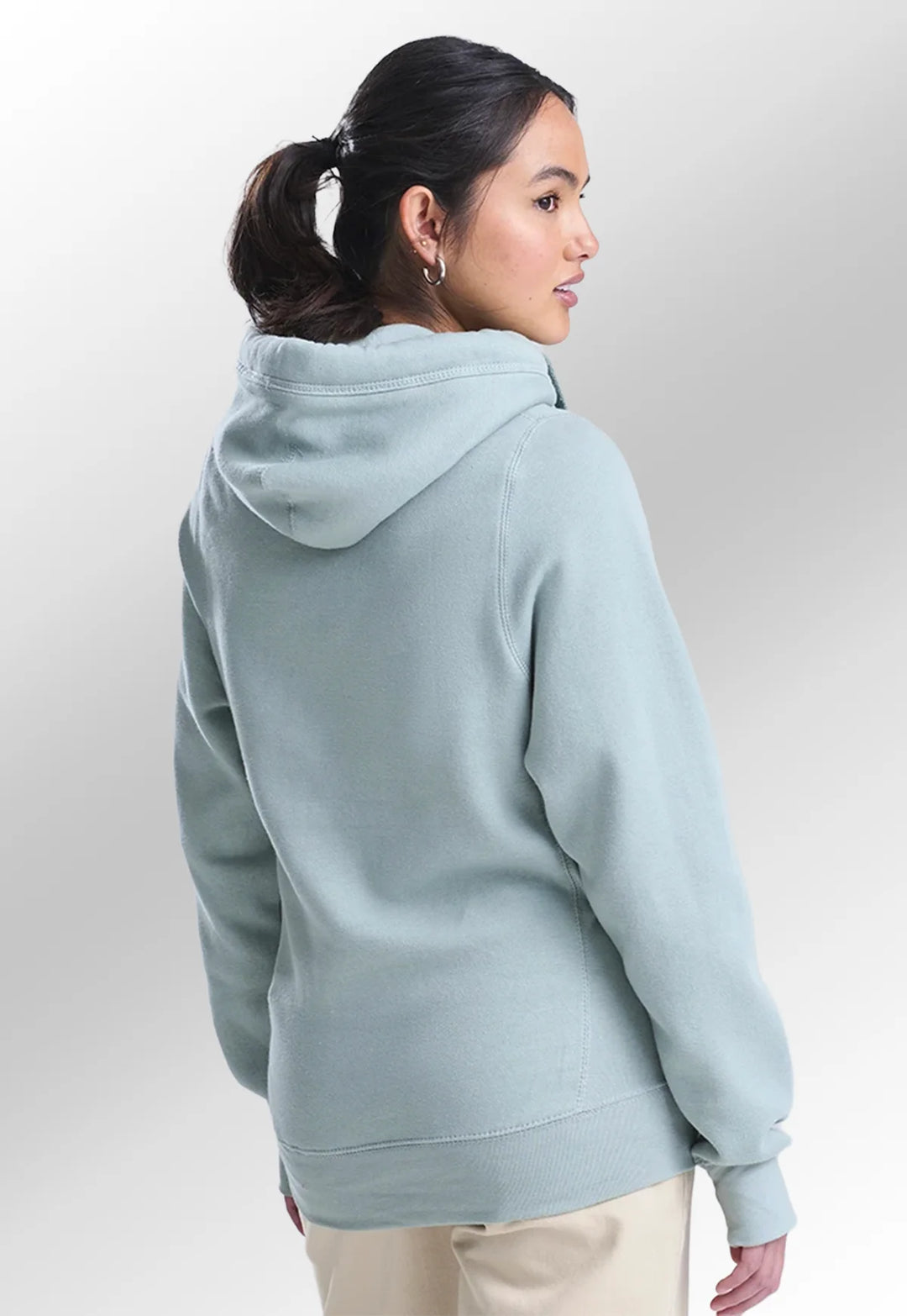 Rear view of model wearing the AWDis Cross Neck Hoodie JH021.