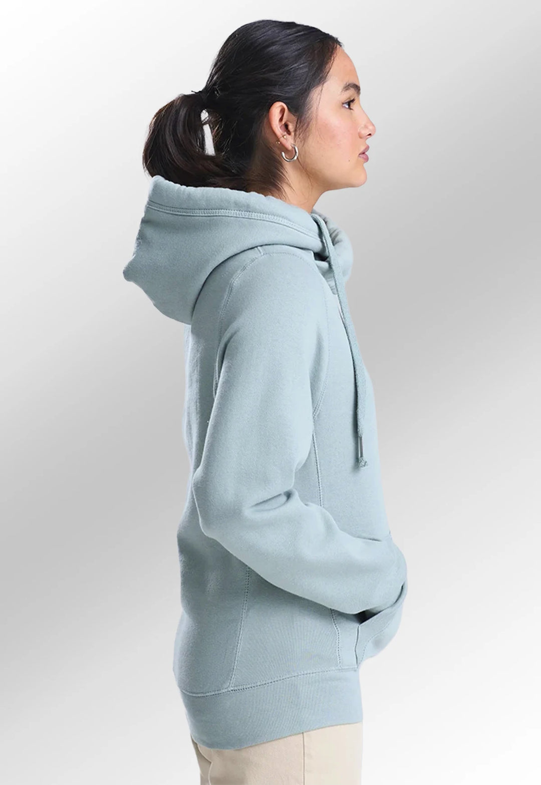 Side view of model wearing the AWDis Cross Neck Hoodie JH021.