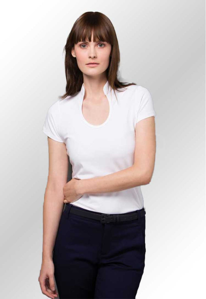 Model wearing a KK755 Women's corporate top with keyhole neck in White