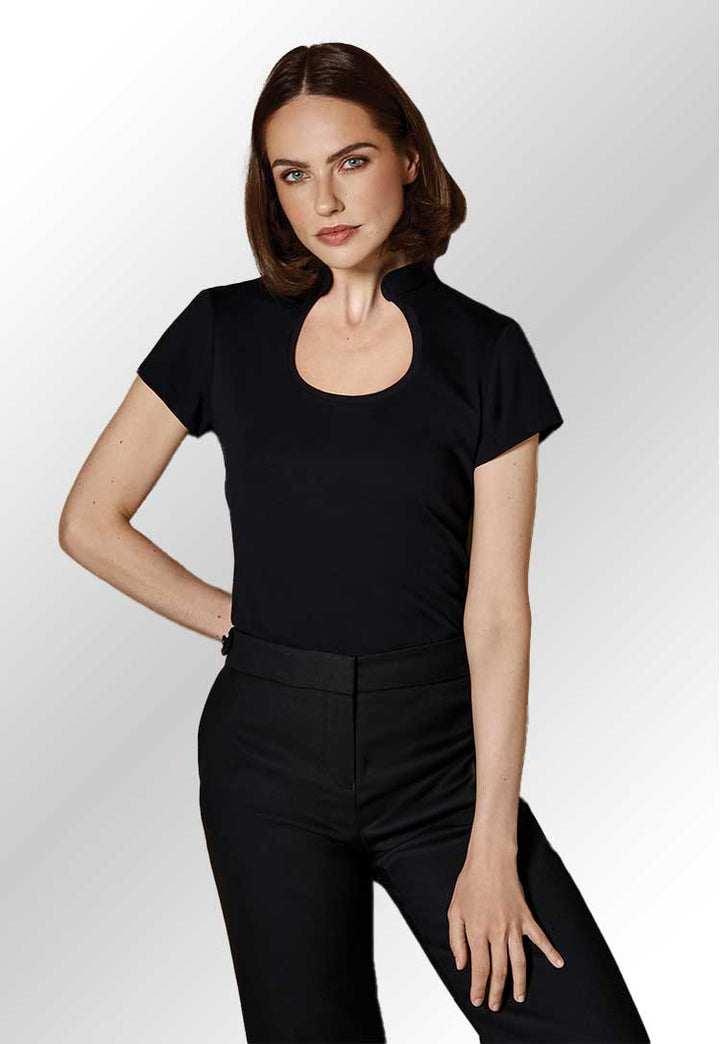 Model wearing a KK755 Women's corporate top with keyhole neck in Black