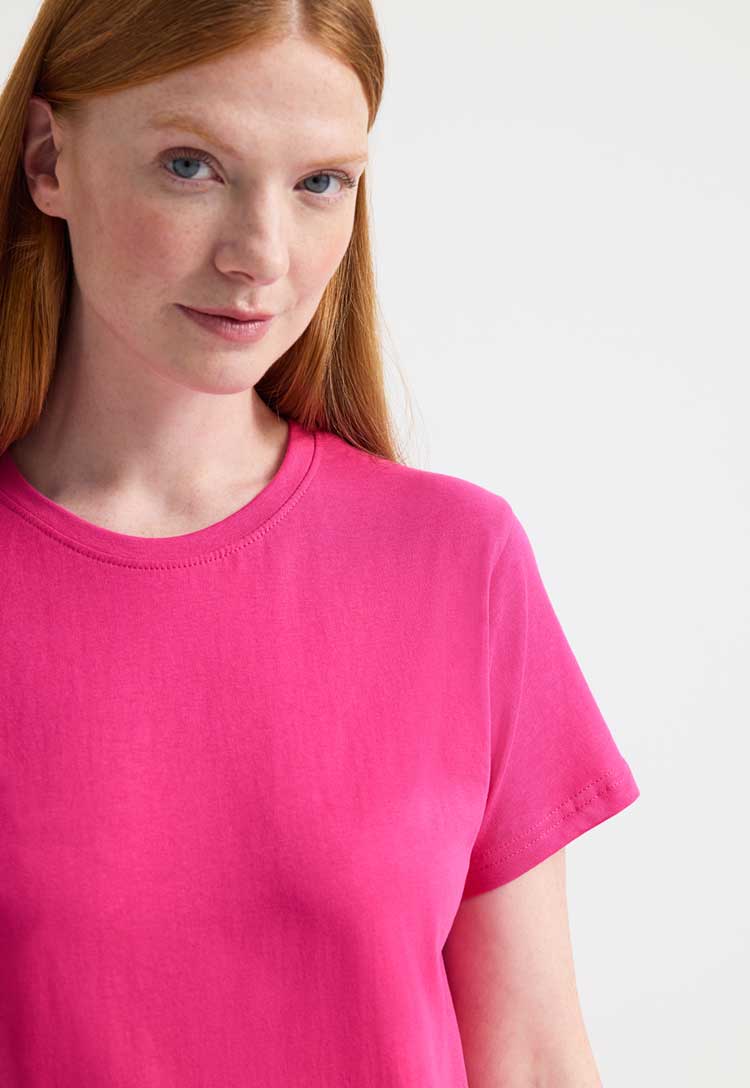 close up model wearing Ladies Classic Crew Neck T-Shirt  in hot pink