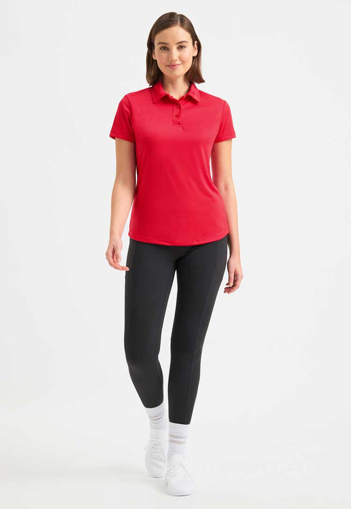 full length model wearing Ladies Ultra Cool Polo Shirt in red