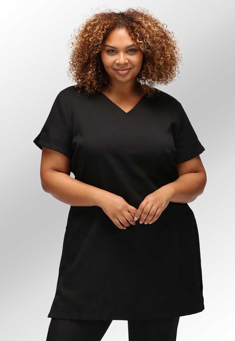 Model Wearing Lena V Neck Beauty Tunic with Pockets in Black