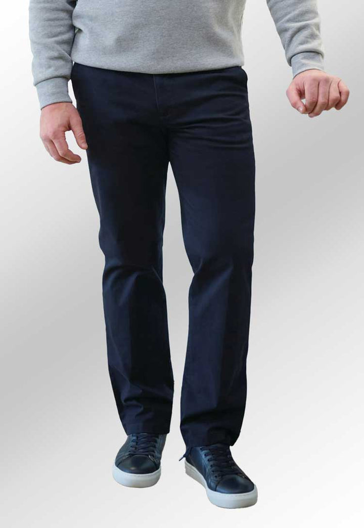 Model wearing Leo Classic Fit chinos in navy