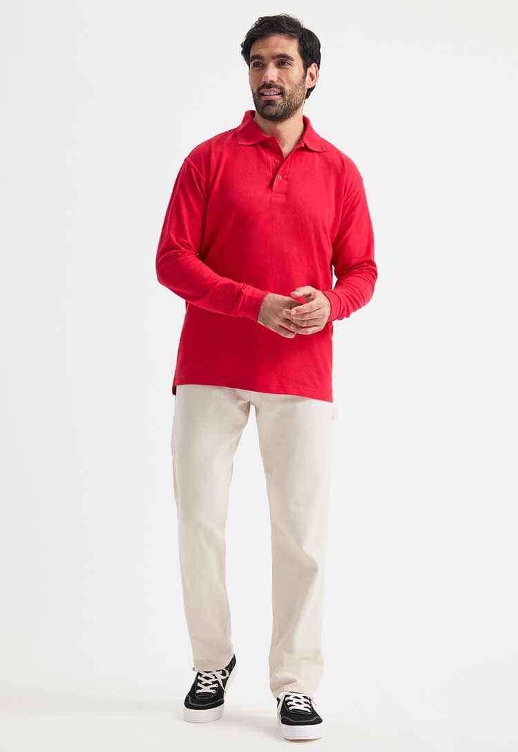 full length of model wearing uneek long sleeve polo in red