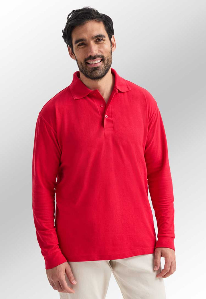 model wearing uneek long sleeve polo in red