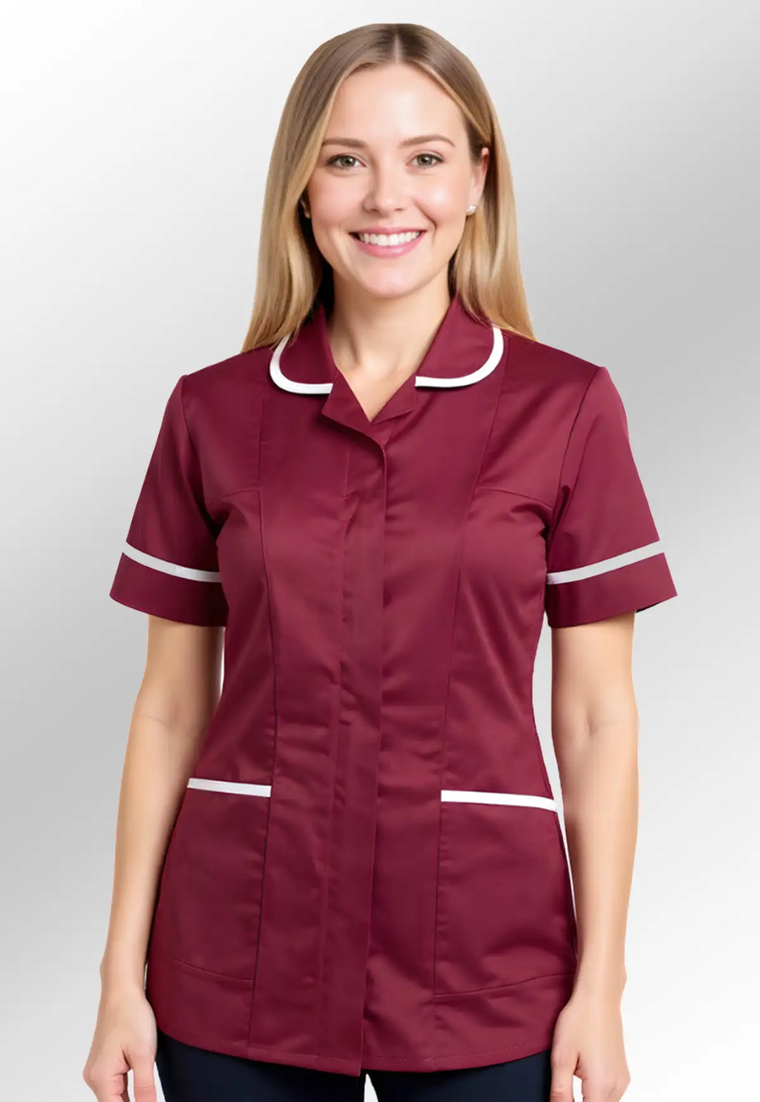 Model wearing maroon tunic with white trim