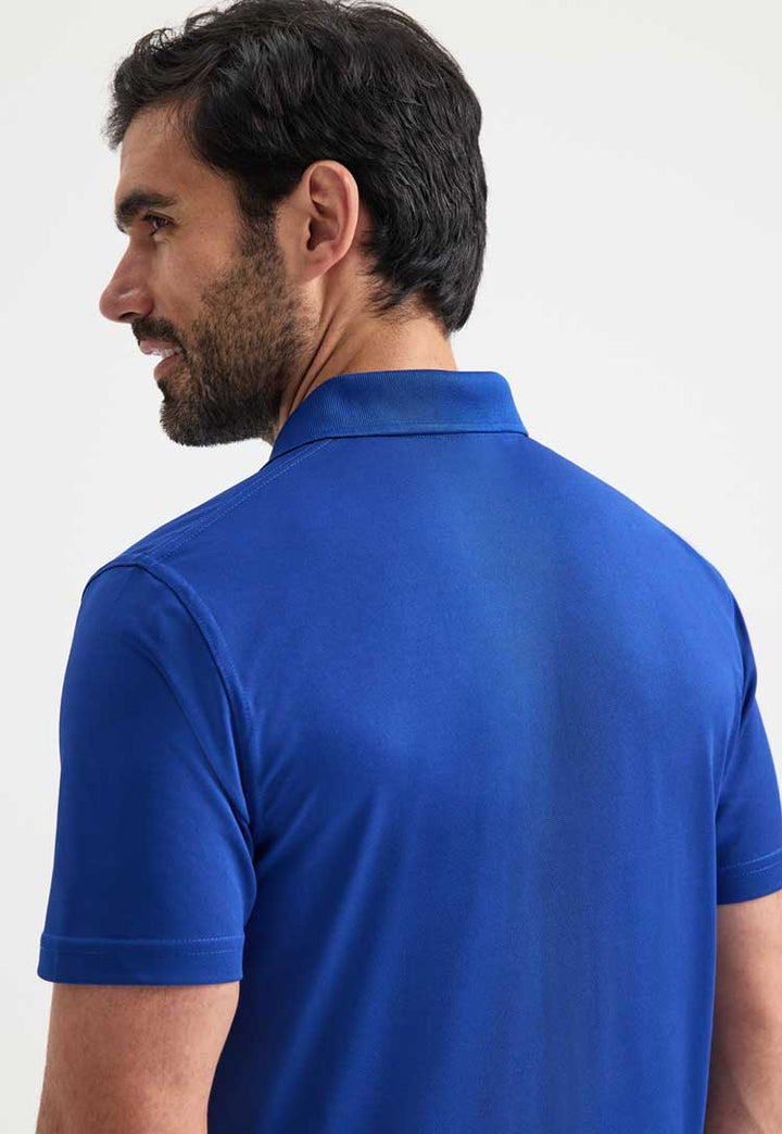 close up back view of model wearing Men's Super Cool Workwear Polo Shirt in royal blue