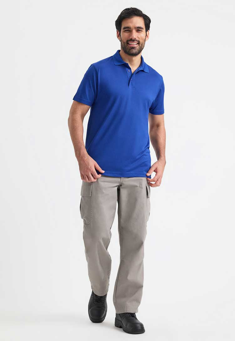 full length model wearing Men's Super Cool Workwear Polo Shirt in royal blue